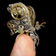 Illustration for article titled Enjoy These Clever Miniature Sculptures Made From Old Clock Parts